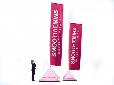 Expand-flagstand-xl-both-sizes-smoothiemins-woman-white-background-4-3