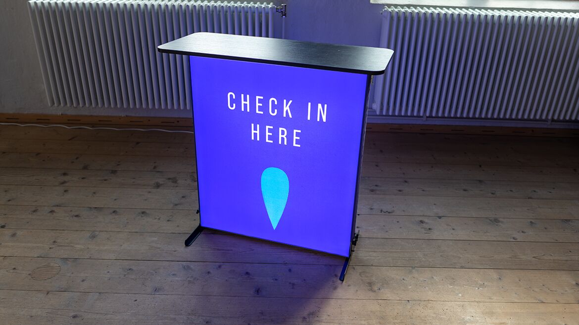 Expand-lightbox-counter-check-in-here-16-9